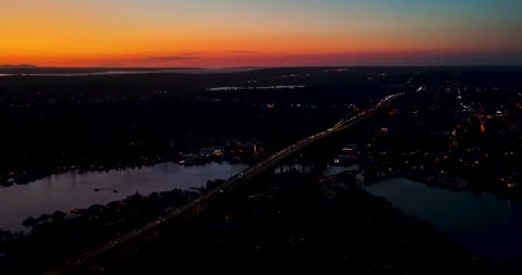 Aerial Interstate 5 Freeway Traffic at Dusk with City Lights and Sunset Sky 스톡 동영상 332016910