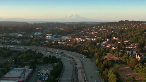 Aerial: Interstate 90 freeway and Mt Rainier, Seattle, Washington, USA Stock Footage 159649795