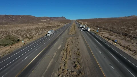 Aerial interstate freeway Las Vegas to Los Angeles Halloran Springs 4K Stock-Footage 99717830