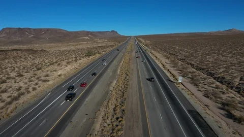 Aerial interstate freeway Los Angeles to Las Vegas Halloran Springs fast 4K Stock Footage 99733794