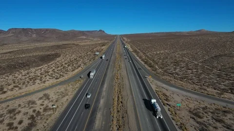 Aerial interstate freeway traffic Nevada California border fast 4K Stock-Footage 99718168