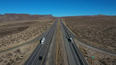 Aerial interstate freeway traffic Nevada California border area 4K 206 Stock Footage 99718478