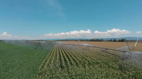 Aerial irrigation system on a field Stock Footage 129504008