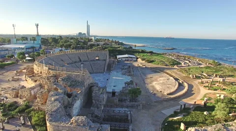 Aerial Israel. Flying over Caesarea ancient roman amphitheater coliseum Stock Footage