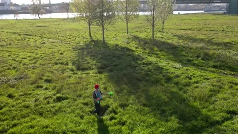Aerial of a juggler doing tricks in 4k, drone juggling Video stock 150205649