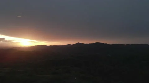 Aerial JungleHills Storm02 PullBack Stock Footage 234021498