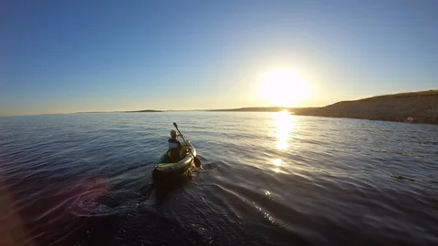 AERIAL Kayaking at sunset Stock Footage 112132288