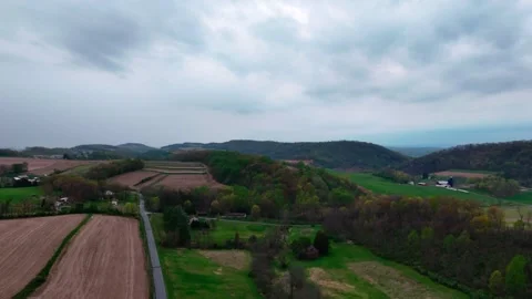 Aerial landscape of corn fields and farmland mountains in rural Appalachia .. Stock-Footage 318618926