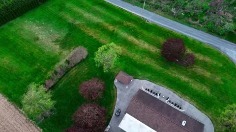 Aerial landscape of corn fields and farmland mountains in rural Appalachia .. 動画素材 318619257