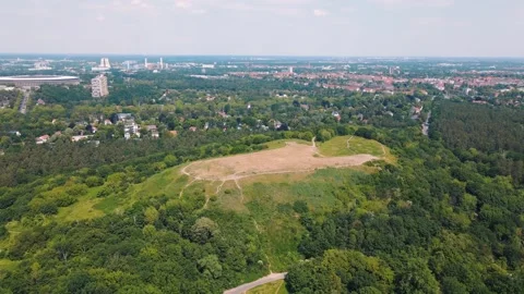 Aerial landscape of Drachenberg trash mountain in Grunewald forest during s.. Stock Footage 249102953