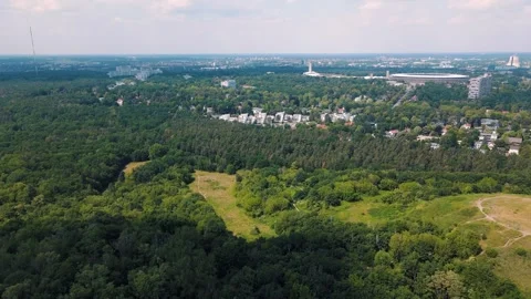 Aerial landscape of Drachenberg trash mountain and residential buildings in.. 스톡 동영상 249111153