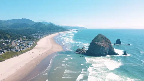 Aerial landscape of Haystack Rock formation on Cannon Beach Oregon Coast Pa.. Stock Footage 293510201