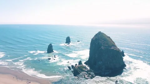 Aerial landscape of Haystack Rock formation on Cannon Beach Oregon Coast Pa.. Stock Footage 293510386