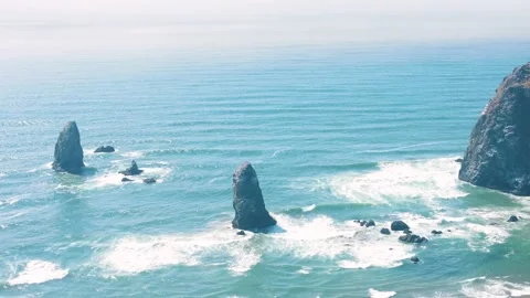 Aerial landscape of Haystack Rock formation on Cannon Beach Oregon Coast Pa.. Stock Footage 293511670