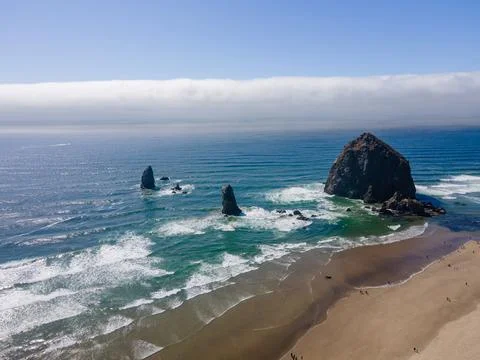 Aerial landscape of Haystack Rock formation on Cannon Beach Oregon Coast Pa.. Stock Photos