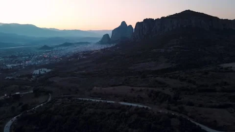 Aerial landscape of Meteora cliff mountains rock formations winter sunset i.. Stock Footage 314609341