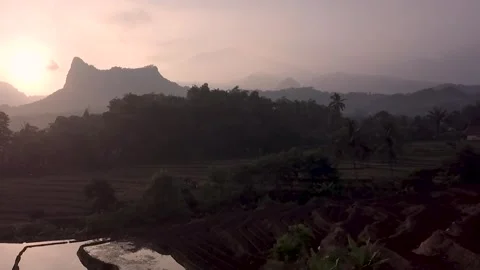 Aerial landscape view of countryside fields, mountain background Stock Footage 317297888