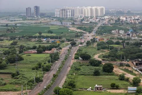 Aerial landscape view of a developing city, outskirts of Delhi and Gurugram.  Stock Photos