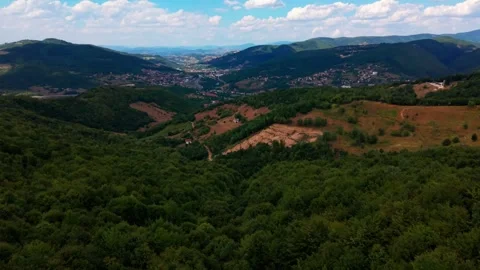 Aerial Landscape View of Green Forested Hills and Valley Overlooking Sarajevo Stock-Footage 343156653