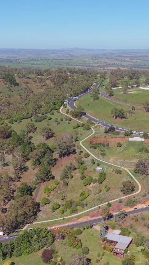 Aerial landscape view toward Mount Panorama in Bathurst NSW Stock Footage 335000467