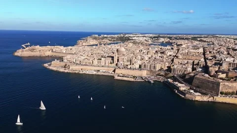 Aerial landscape wide angle high drone shot of valletta Malta in summer with Stock Footage 335295862