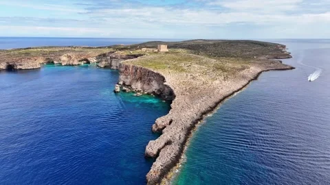 Aerial Lantern Point Comino Malta cliffs coastline sea Stock Footage 333991531