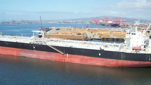 Aerial of large container vessel standing in Port of Long Beach Stock Footage 116488063