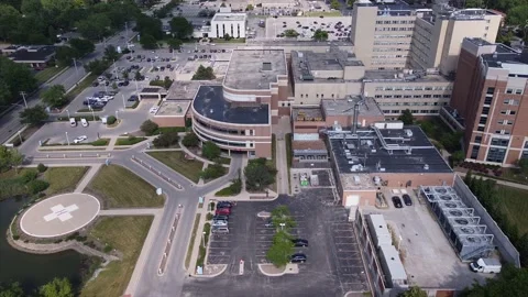 Aerial of Large Hospital and Emergency Room Stock Footage