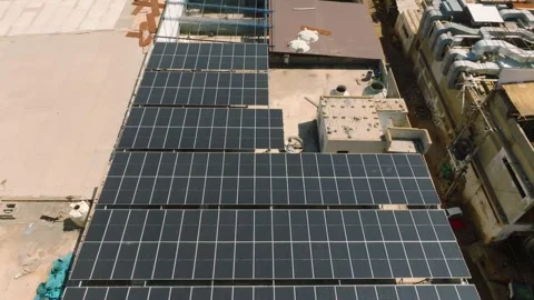 Aerial - Large Rooftop Solar Panel Array on Factory Building in Karachi Pakistan Stock-Footage 336291875