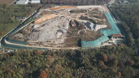 Aerial of large solid waste landfill Mozzate Italy Stock Footage 277126834