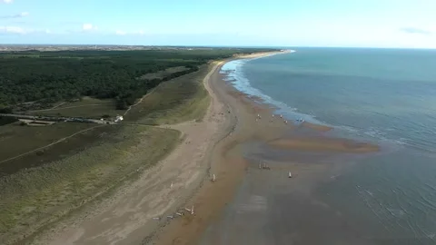 Aerial large view of the wild beach with sail tank groups Stock Footage 144552791