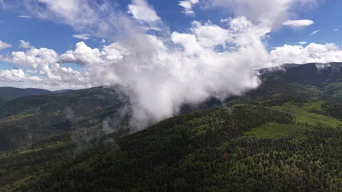 Aerial of large white clouds in Carson National Forest near Sipapu New Mexico Vídeos de archivo 346192272