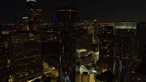 Aerial lateral footage Downtown Houston Texas USA night Stock Footage