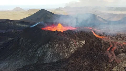 Aerial of Lava Flow Creating New Land Formation Stock Footage 317812820