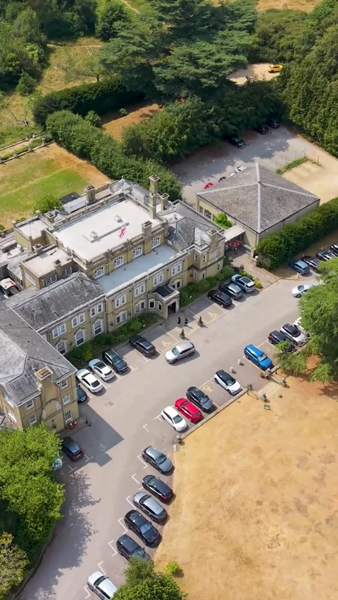 Aerial Left Orbit of Chilworth Manor Hotel, Hampshire, England. Vertical format. Stock Footage 342235909