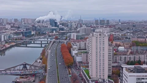 Aerial left pull-out Quai de Bercy Ivry-sur-Seine Périphérique Marne railway Stock Footage 325781210