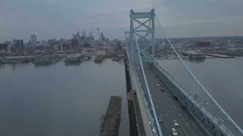 Aerial Left to Right over Benjamin Franklin Bridge in Philadelphia Stock Footage 233210923