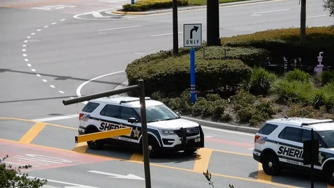 Aerial Left To Right Pan Three Police Cars Sheriff In Orlando Florida As Dis Stock Footage 129040816