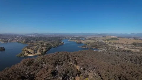 Aerial lifting shot overlooking Canberra Stock Footage