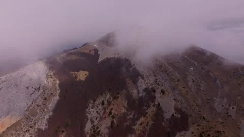 Aerial light breaks through mist over Col de Rousset Stock Footage 307316978