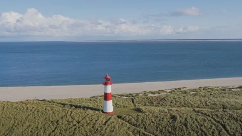 Aerial of lighthouse on a hill Stock Footage 71567152