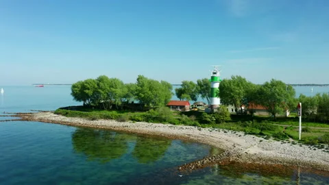 Aerial of a lighthouse by the sea Stock Footage 155114032