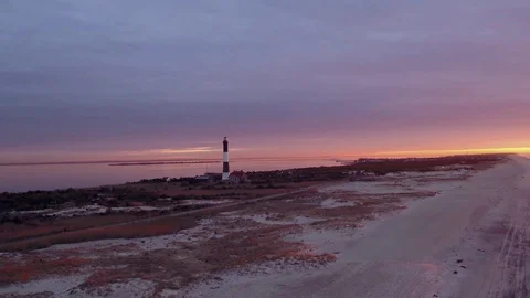 Aerial lighthouse at sunrise Stock Footage 74088728