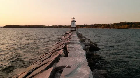 Aerial: Lighthouse at Sunset Stock Footage 141327835