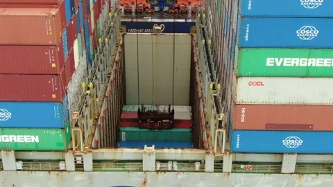 Aerial: Loading containers onto a Container Ship Stock Footage 149899039
