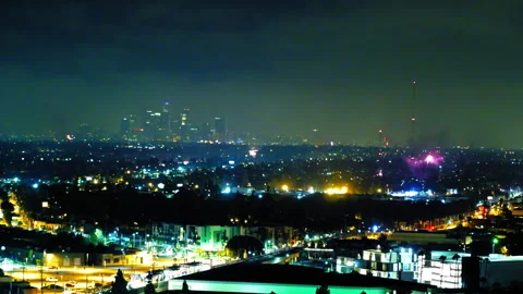 Aerial Lockdown Shot Of Fireworks In Modern City At Night - Culver City, Stock Footage 255409003