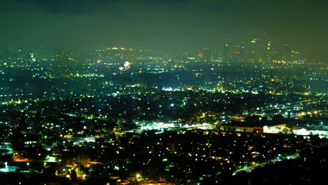 Aerial Lockdown Shot Of Fireworks Sparkling In Modern Financial District Against Stock Footage 255411219