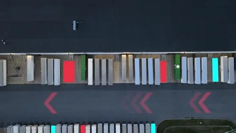 Aerial logistics warehouse with AI optimization overlay. Smart trucking 動画素材 334997796