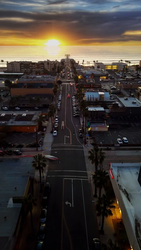 Aerial long exposure frames of street at sunset to create time lapse with sun. Stock Footage 87898440