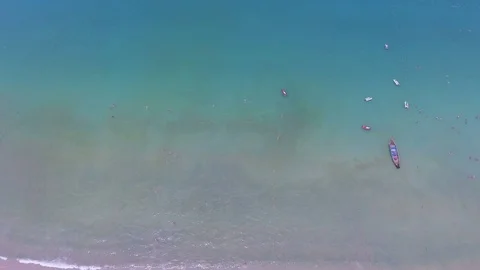 Aerial - long smooth sweep over patong beach Stock-Footage 73357347